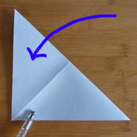 folding square sheet of paper into a triangle shape