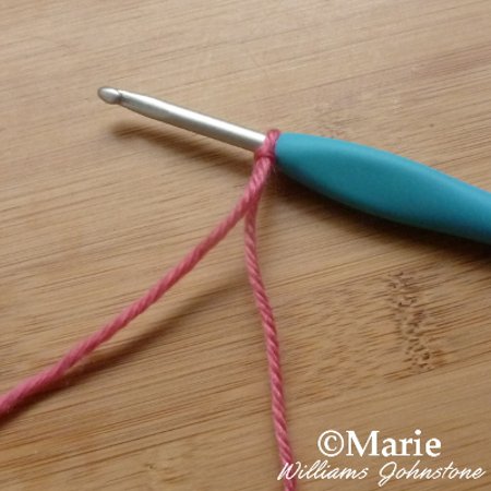 Cast on slip knot on crochet hook ready to start crocheting for beginners tutorial craftymarie